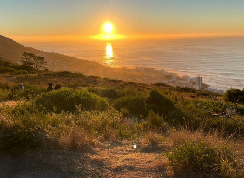 enjoying the sunset on Signal Hill one of the many fun activities in Cape Town