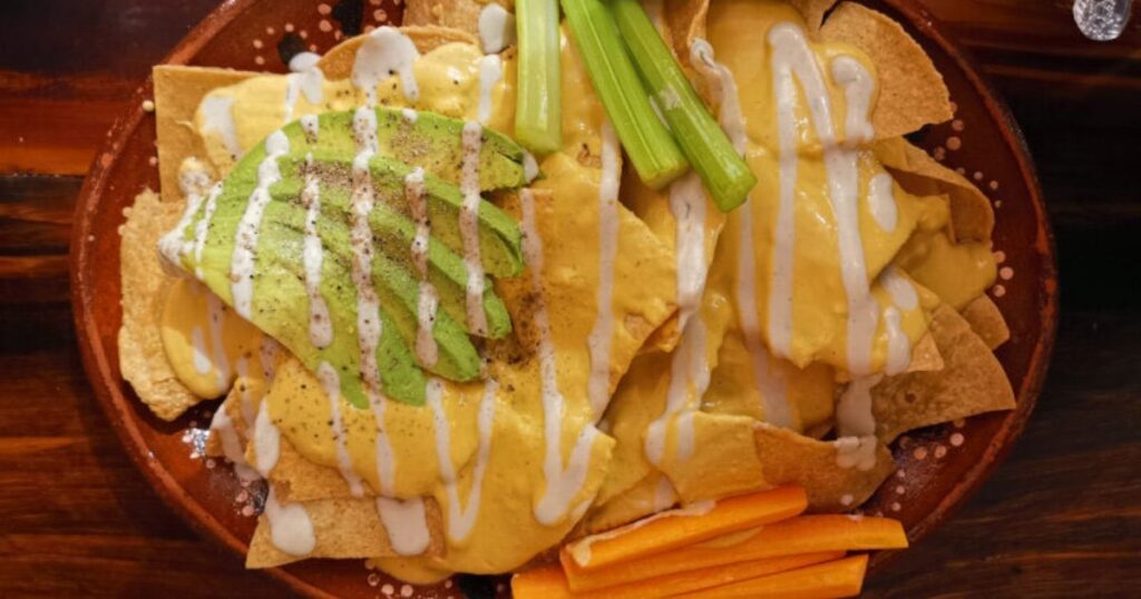 Vegan nachos with cheese made from pumpkin seeds