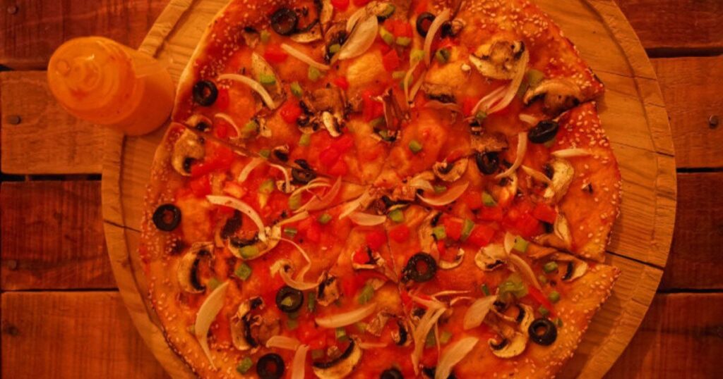 Veganized medium-size pizza with a thin crust